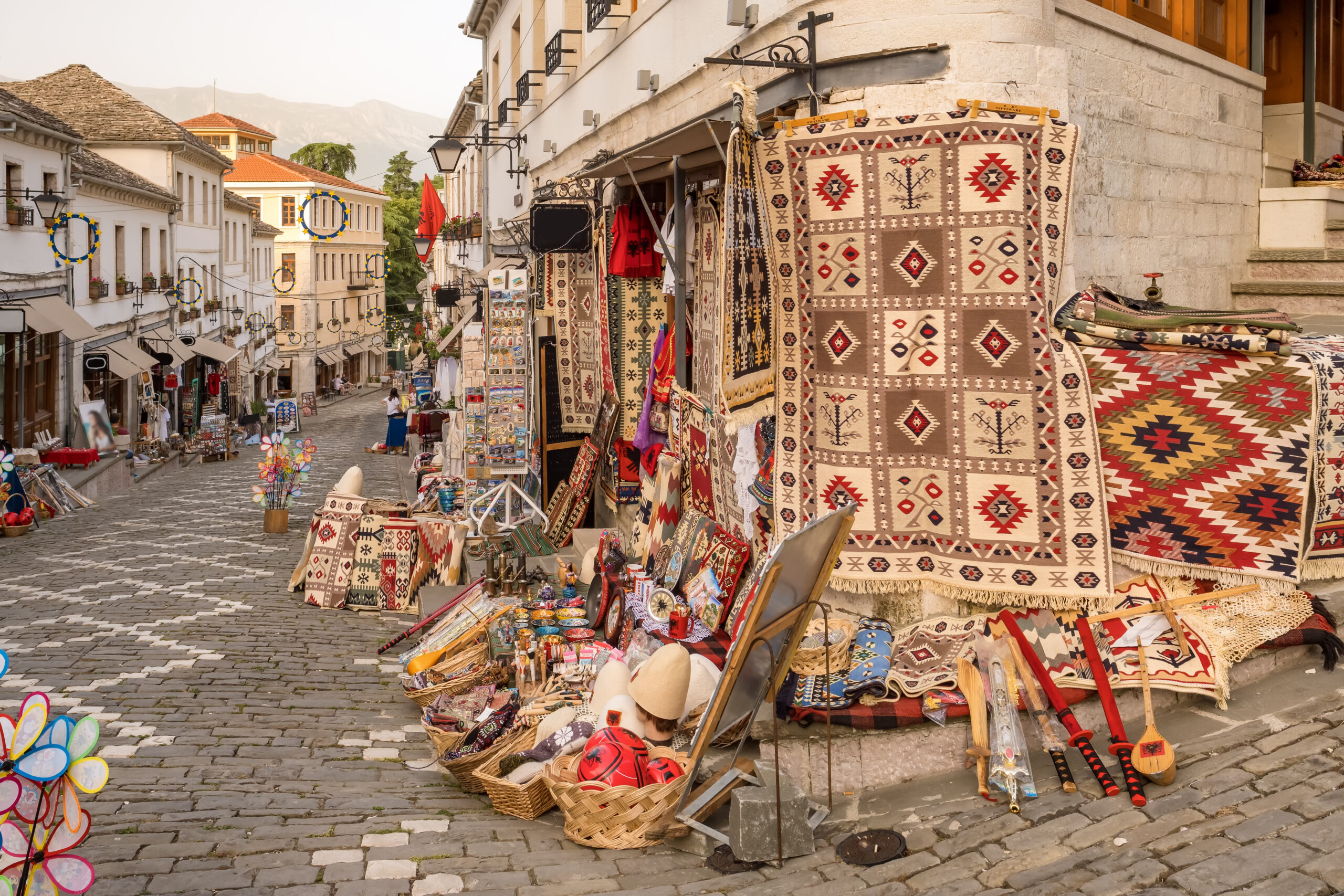Souvenir shops in old town of Gjirokaster in Albania. Old town of Gjirokaster is a World Heritage Site by UNESCO.