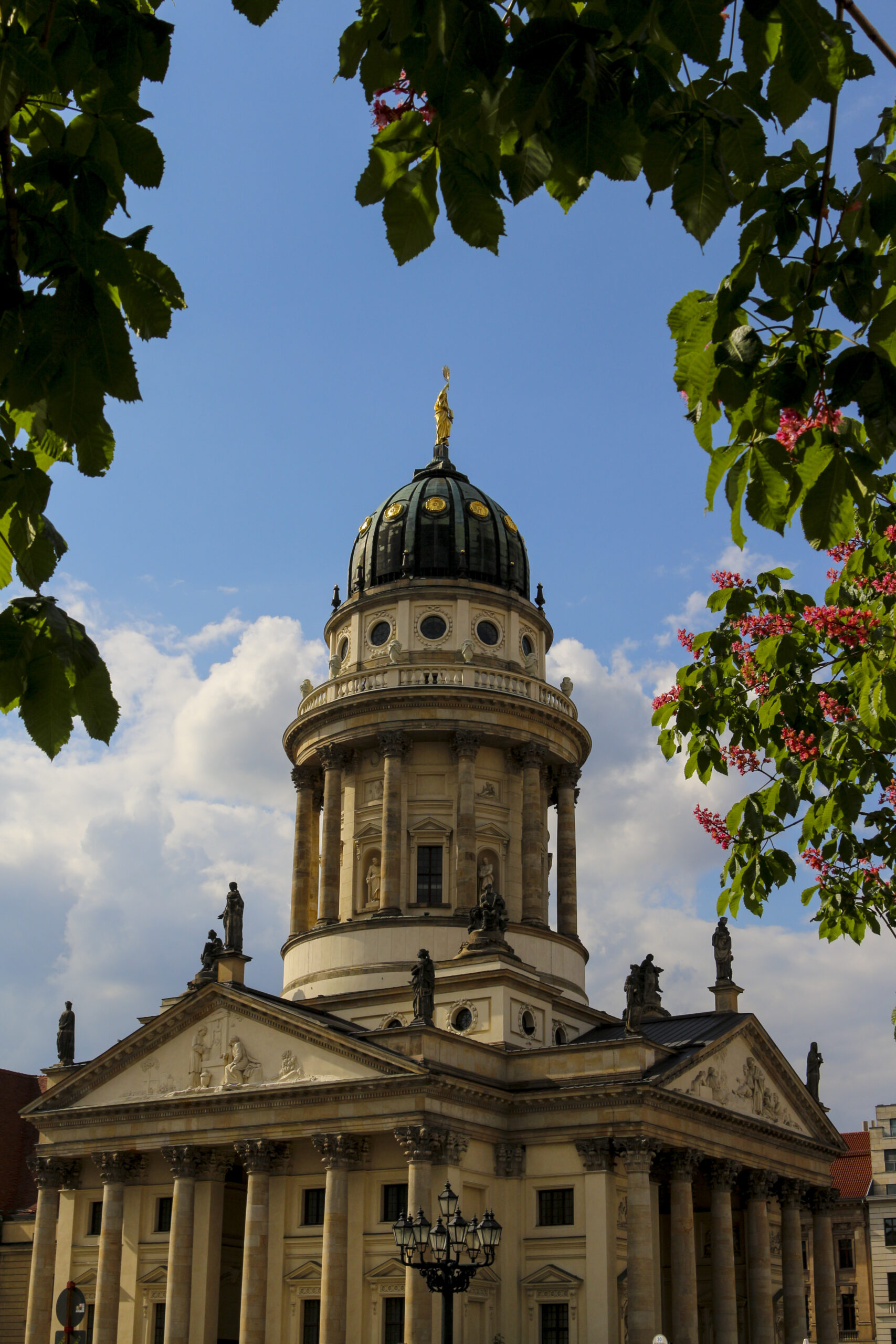 A vertical shot of the gorgeous Deutscher Dom in Berlin, Germany during daylight